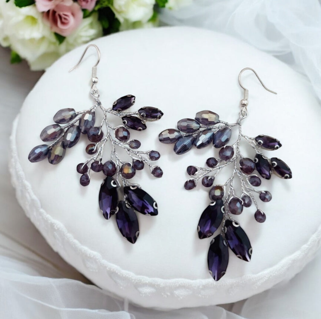Purple statement earrings