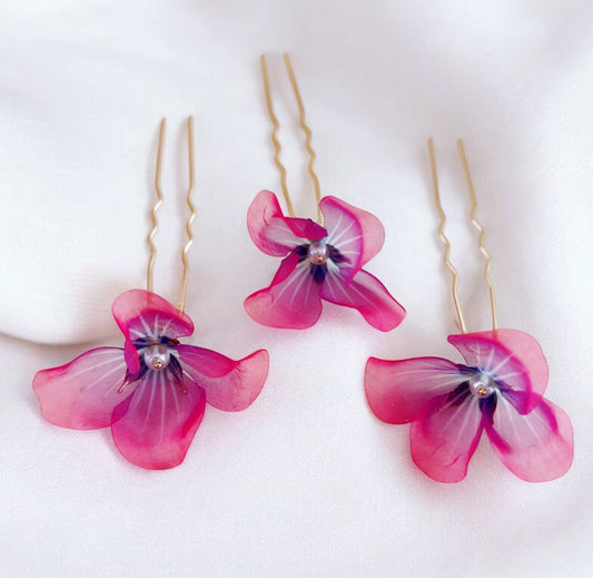 Bright pink and purple flower hair pins