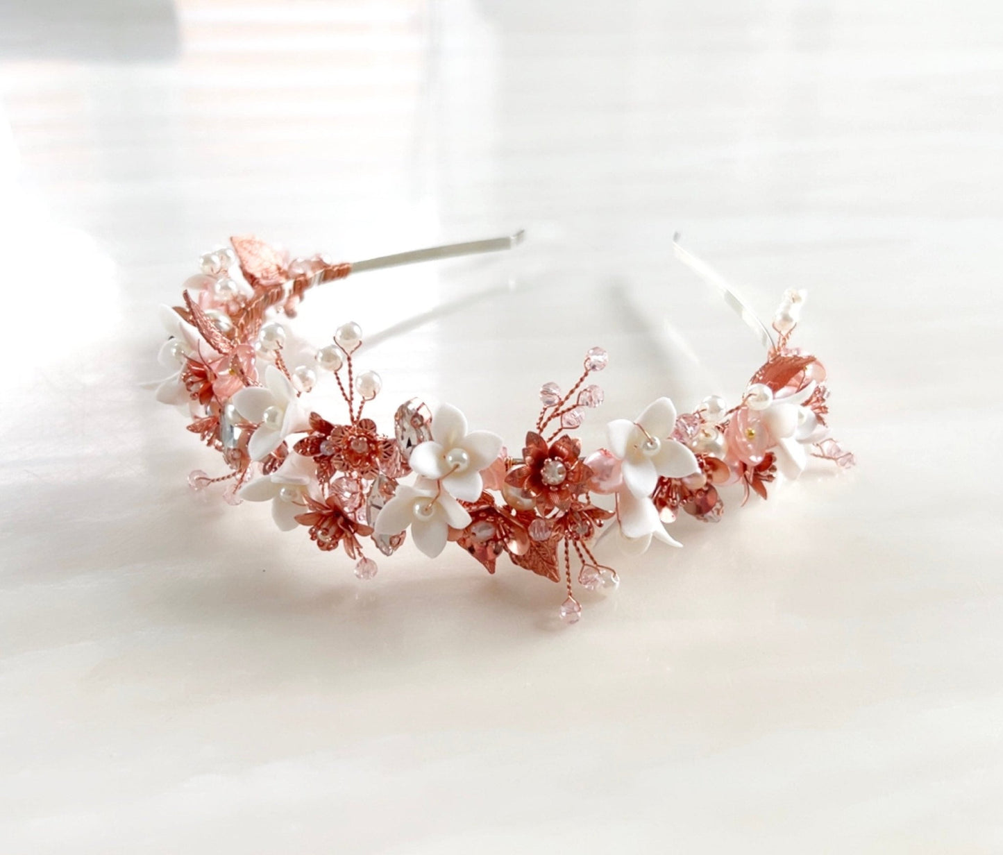 Blush pink bridal headband with white porcelain flowers - Petal & Pearl