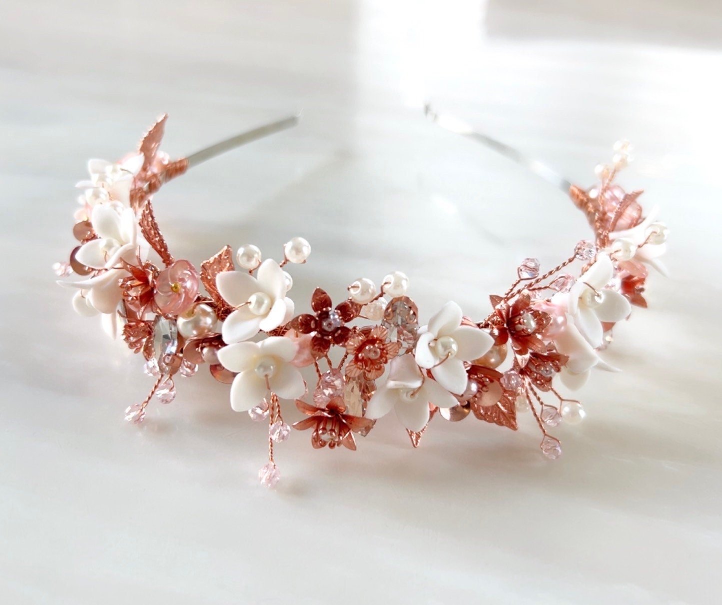 Blush pink bridal headband with white porcelain flowers - Petal & Pearl