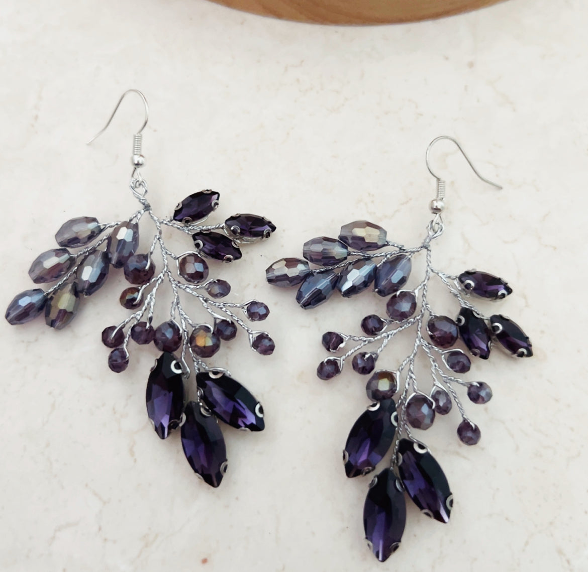 Purple statement earrings