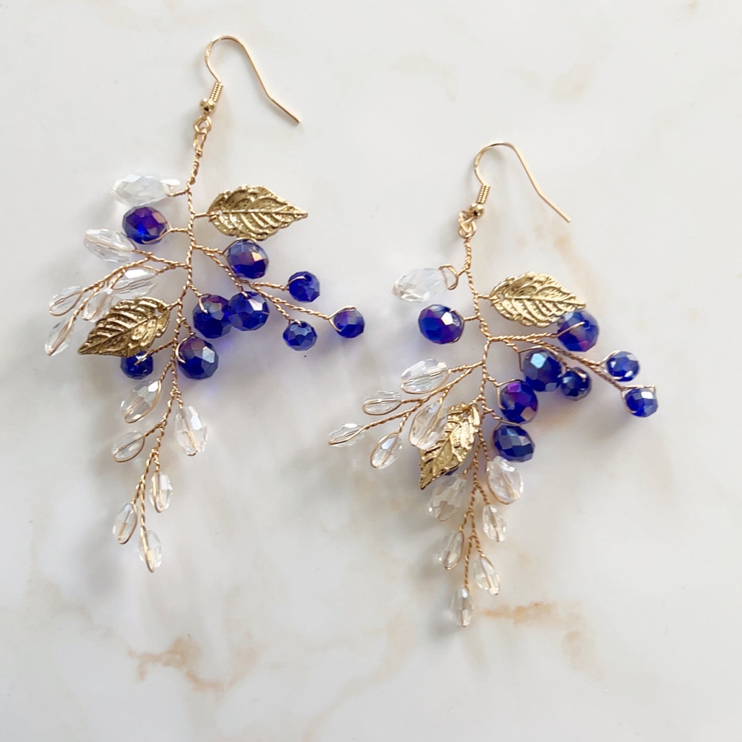 Royal blue crystal and gold leaf earrings