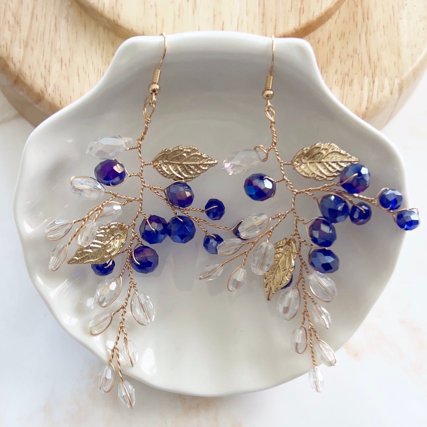 Royal blue crystal and gold leaf earrings