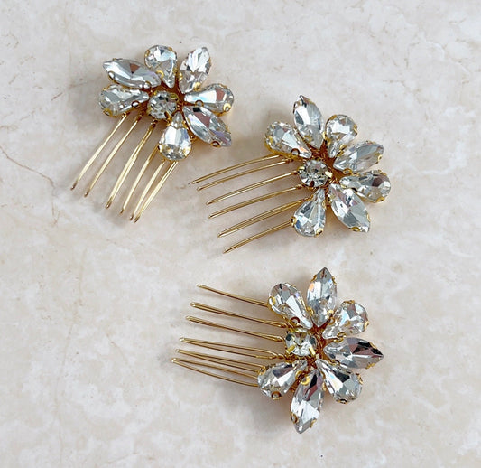 Set of three gold crystal hair combs